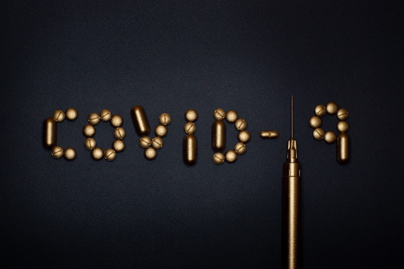 Covid 19 spelled out with pills